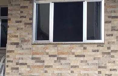 Imagem: A casa possui 2 Dormitórios, 2 Banheiros, 1 Vaga na garagem