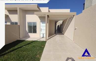 Imagem: A casa possui 3 Dormitórios, 1 Banheiro, 2 Vagas na garagem