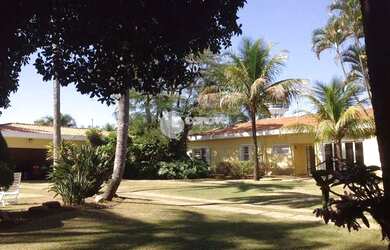 Imagem: A casa possui 5 Dormitórios, 5 Banheiros, 5 Vagas na garagem