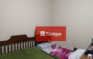 Imagem: A casa possui 3 Dormitórios, 1 Banheiro, 2 Vagas na garagem