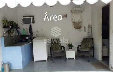 Imagem: A casa possui 2 Dormitórios, 3 Banheiros, 2 Vagas na garagem