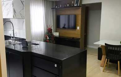 Imagem: O apartamento possui 2 Dormitórios, 1 Banheiro, 1 Vaga na garagem