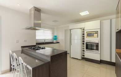 Imagem 12: Casa com suíte no térreo à venda, 317 m² por R$ 2.100.000 - Santa Felicidade - Curitiba/PR