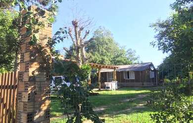 Imagem: A casa em condomínio possui 2 Dormitórios, 1 Banheiro e 600m²