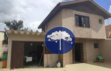 Imagem: A casa possui 4 Dormitórios, 2 Banheiros, 200m² de Área e