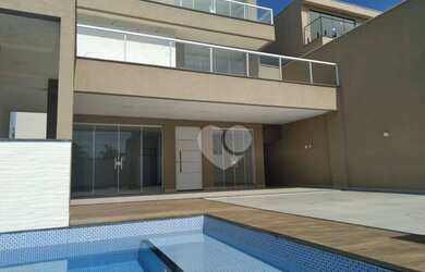 Imagem: A casa em condomínio possui 3 Dormitórios, 4 Banheiros, 2