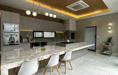 Imagem: A casa em condomínio possui 4 Dormitórios, 5 Banheiros, 2