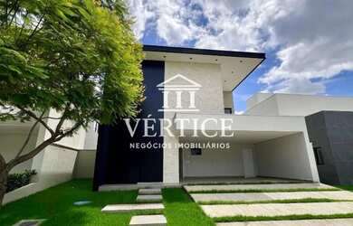 Imagem: A casa possui 4 Dormitórios, 5 Banheiros, 4 Vagas na garagem