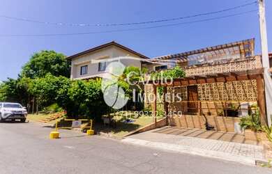 Imagem: A casa possui 5 Dormitórios, 5 Banheiros, 2 Vagas na garagem