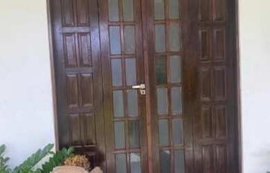 Imagem: A casa possui 3 Dormitórios, 4 Banheiros, 3 Vagas na garagem