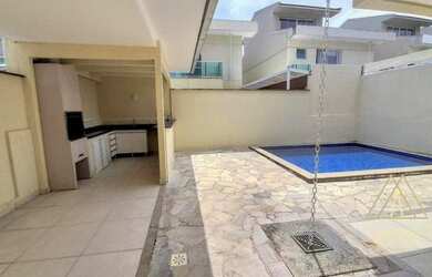 Imagem: A casa em condomínio possui 4 Dormitórios, 5 Banheiros, 2