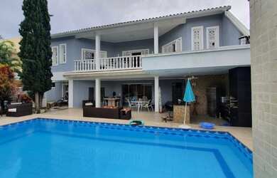 Imagem: A casa em condomínio possui 5 Dormitórios, 5 Banheiros, 5