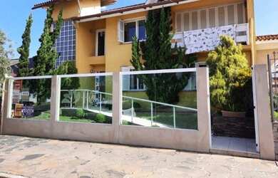 Imagem: A casa possui 4 Dormitórios, 3 Banheiros e está localizado