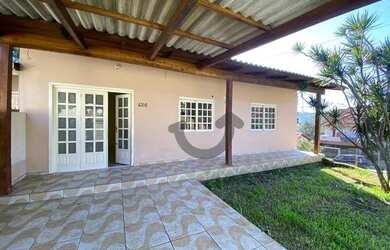 Imagem: A casa possui 4 Dormitórios, 2 Banheiros, 146m² de Área e