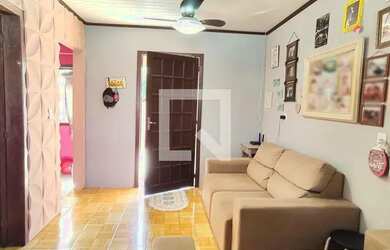 Imagem: A casa possui 2 Dormitórios, 1 Banheiro, 1 Vaga na garagem