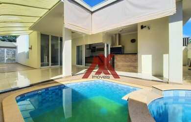 Imagem: A casa em condomínio possui 3 Dormitórios, 5 Banheiros, 4