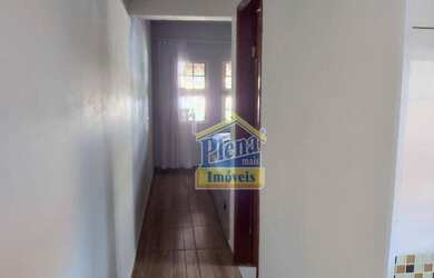 Imagem: A casa possui 2 Dormitórios, 1 Banheiro, 2 Vagas na garagem