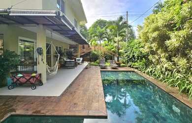 Imagem: A casa em condomínio possui 5 Dormitórios, 5 Banheiros, 2