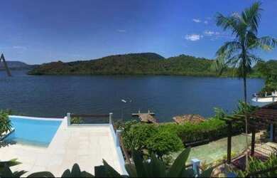 Imagem: A casa possui 5 Dormitórios, 5 Banheiros, 5 Vagas na garagem