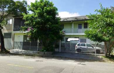 Imagem: A casa possui 2 Dormitórios, 3 Banheiros, 2 Vagas na garagem