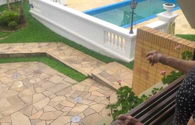 Imagem: A casa possui 5 Dormitórios, 5 Banheiros, 5 Vagas na garagem