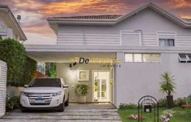 Imagem: A casa possui 3 Dormitórios, 3 Banheiros, 3 Vagas na garagem