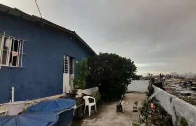 Imagem: A casa possui 3 Dormitórios, 1 Banheiro e está localizado