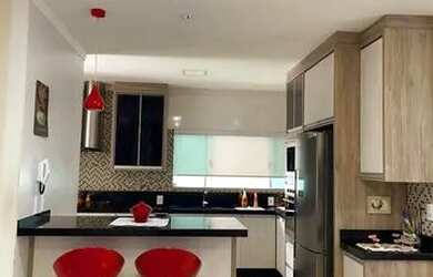 Imagem: A casa possui 3 Dormitórios, 3 Banheiros, 2 Vagas na garagem