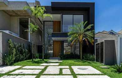 Imagem: A casa em condomínio possui 4 Dormitórios, 4 Banheiros, 2