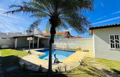 Imagem: A casa possui 5 Dormitórios, 3 Banheiros, 5 Vagas na garagem