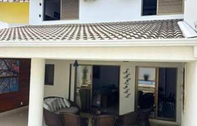 Imagem: A casa possui 3 Dormitórios, 4 Banheiros, 4 Vagas na garagem