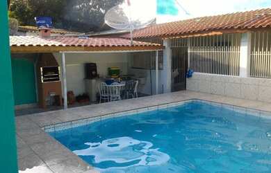 Imagem: A casa possui 5 Dormitórios, 5 Vagas na garagem e está localizado