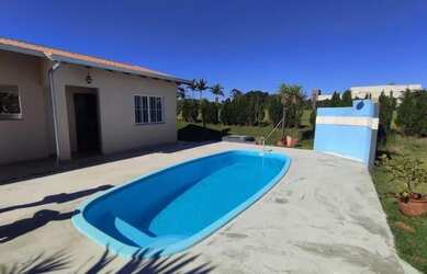 Imagem: A casa em condomínio possui 4 Dormitórios, 5 Banheiros, 5