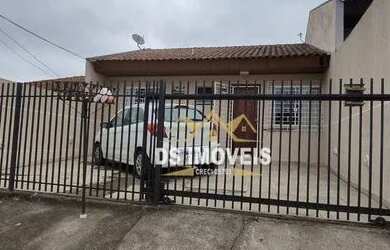 Imagem: A casa possui 2 Dormitórios, 1 Banheiro, 2 Vagas na garagem