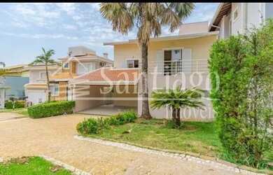 Imagem: A casa em condomínio possui 4 Dormitórios, 5 Banheiros, 4