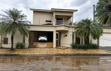 Imagem: A casa possui 5 Dormitórios, 5 Banheiros, 4 Vagas na garagem