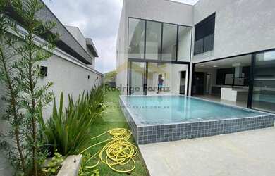 Imagem: A casa para alugar possui 4 Dormitórios, 5 Banheiros, 4 Vagas