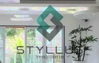 Imagem: A casa possui 3 Dormitórios, 4 Banheiros, 5 Vagas na garagem