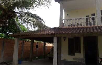 Imagem: A casa possui 3 Dormitórios, 2 Banheiros, 3 Vagas na garagem