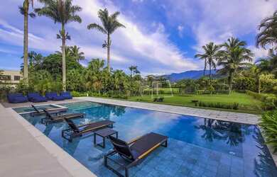 Imagem: A casa em condomínio possui 5 Dormitórios, 5 Banheiros, 4