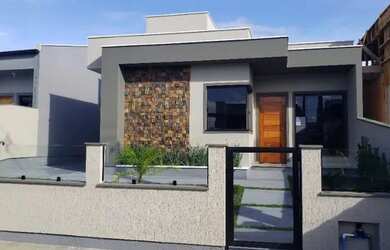 Imagem: A casa possui 3 Dormitórios, 3 Banheiros, 3 Vagas na garagem