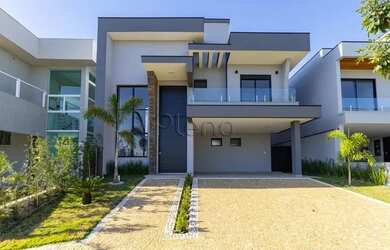 Imagem: A casa em condomínio possui 4 Dormitórios, 5 Banheiros, 2