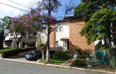 Imagem: A casa possui 4 Dormitórios, 4 Banheiros, 4 Vagas na garagem