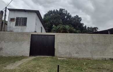 Imagem: A casa possui 2 Dormitórios, 2 Banheiros e está localizado