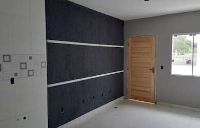 Imagem: A casa possui 2 Dormitórios, 1 Banheiro, 1 Vaga na garagem