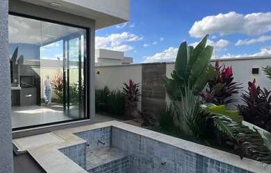 Imagem: A casa possui 3 Dormitórios, 4 Banheiros, 4 Vagas na garagem