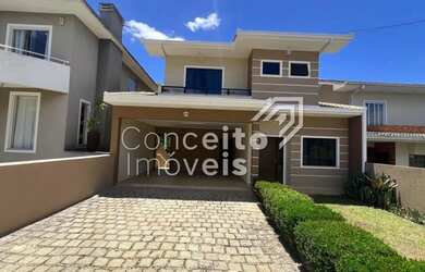 Imagem: A casa em condomínio possui 3 Dormitórios, 3 Banheiros, 2