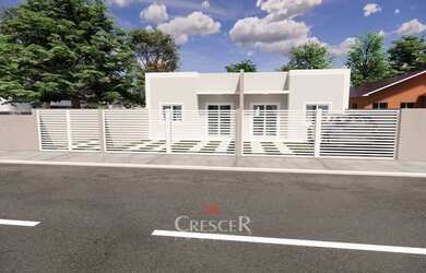 Imagem: A casa possui 2 Dormitórios, 1 Banheiro, 2 Vagas na garagem