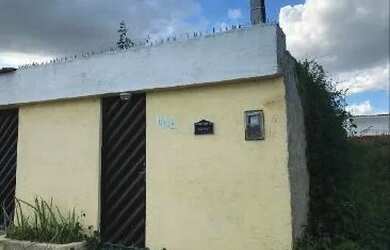 Imagem: A casa à venda possui 3 Dormitórios, 1 Banheiro, 1 Vaga na