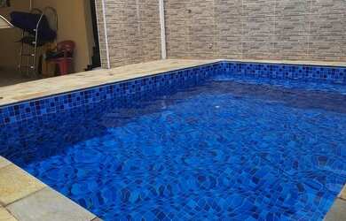 Imagem: A casa possui 3 Dormitórios, 3 Banheiros, 5 Vagas na garagem